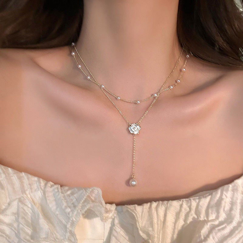 Koyace Camellia Layered Pearl Tassel Necklace