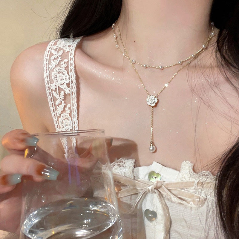 Koyace Camellia Layered Pearl Tassel Necklace