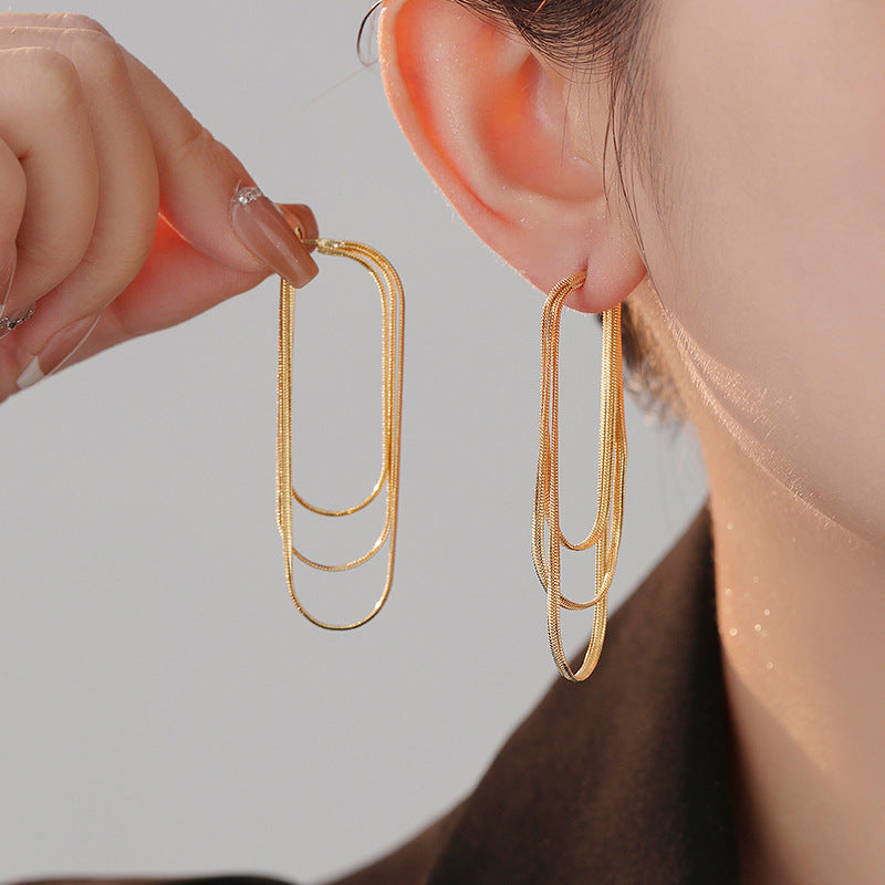 Koyace Circular Multi-chain Tassel Earrings