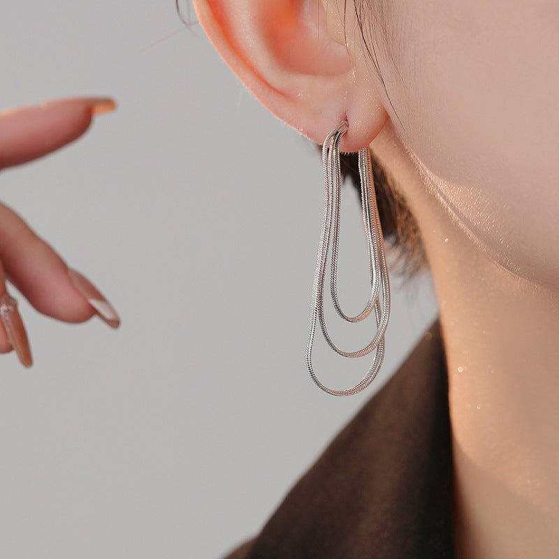 Koyace Circular Multi-chain Tassel Earrings