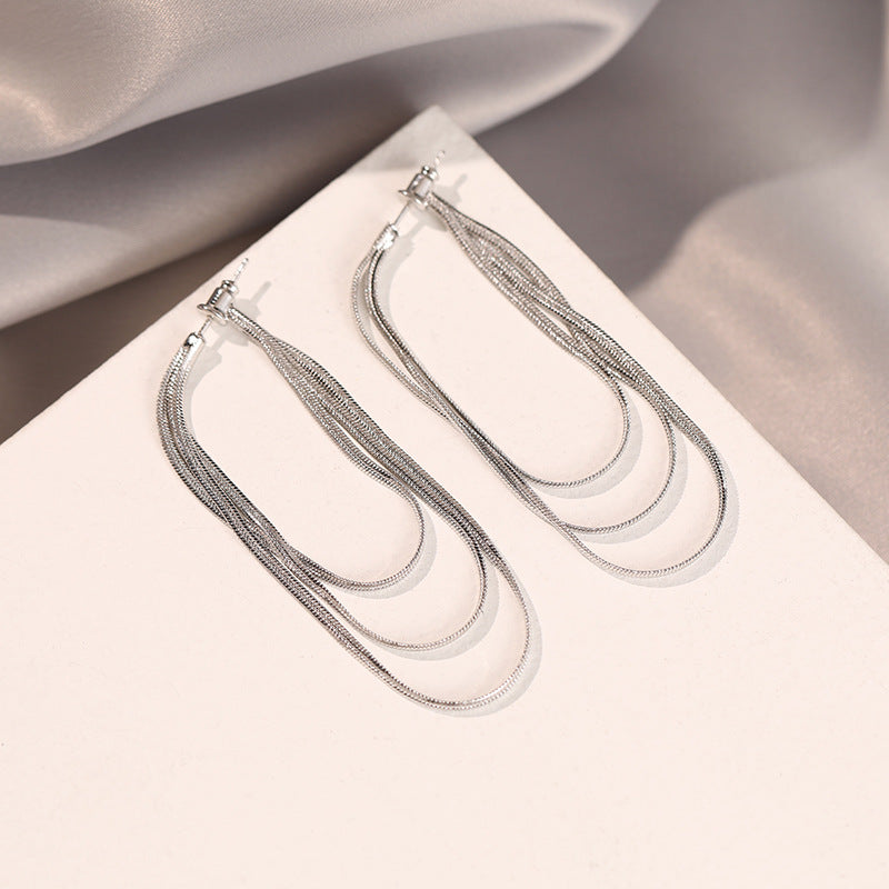 Koyace Circular Multi-chain Tassel Earrings