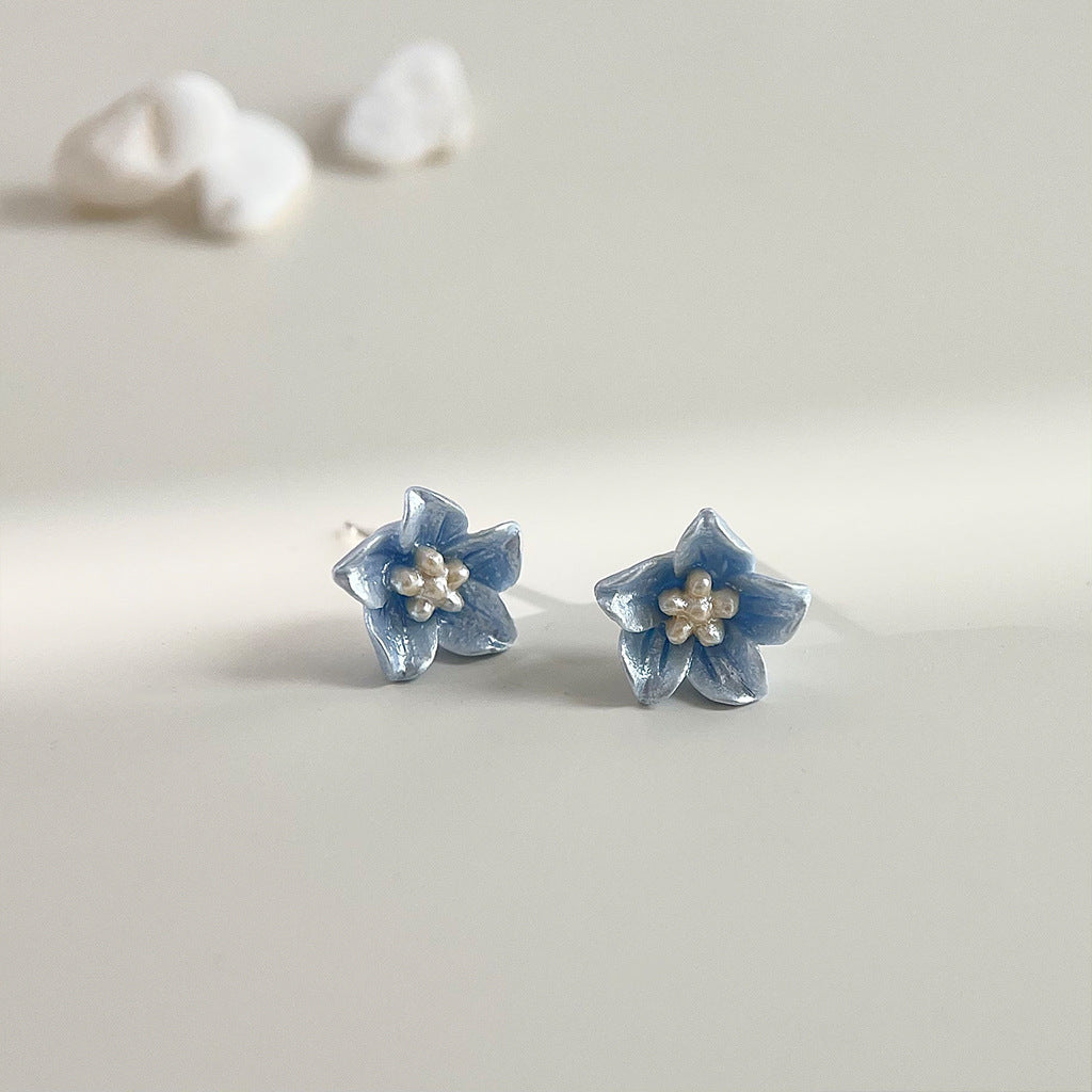 Koyace Klein Blue Resin Flower Stud Earrings