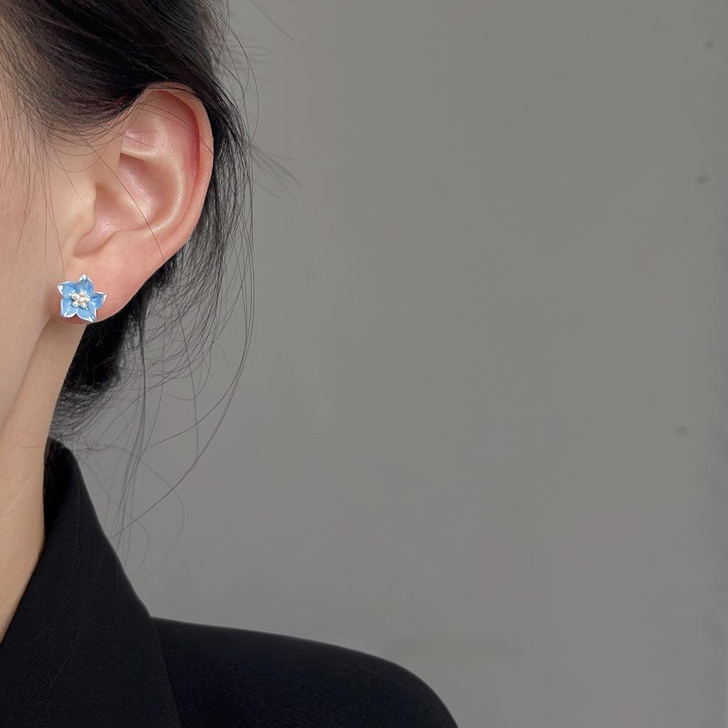 Koyace Klein Blue Resin Flower Stud Earrings