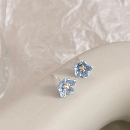 Koyace Klein Blue Resin Flower Stud Earrings