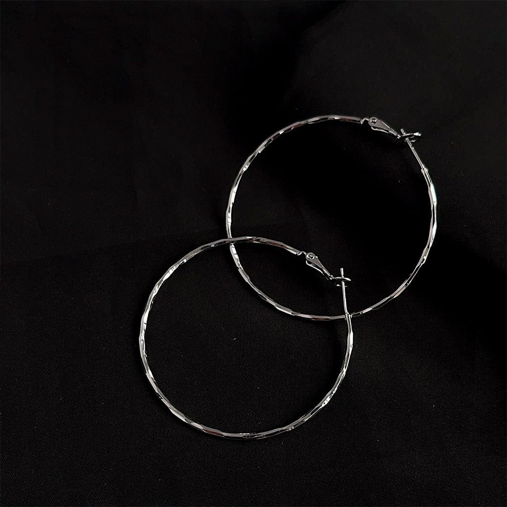 Koyace Metal Circular Twisted Large Ear Rings
